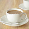 white ceramic cup and saucer